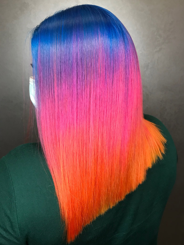 woman with beautiful hair gradient in salon
