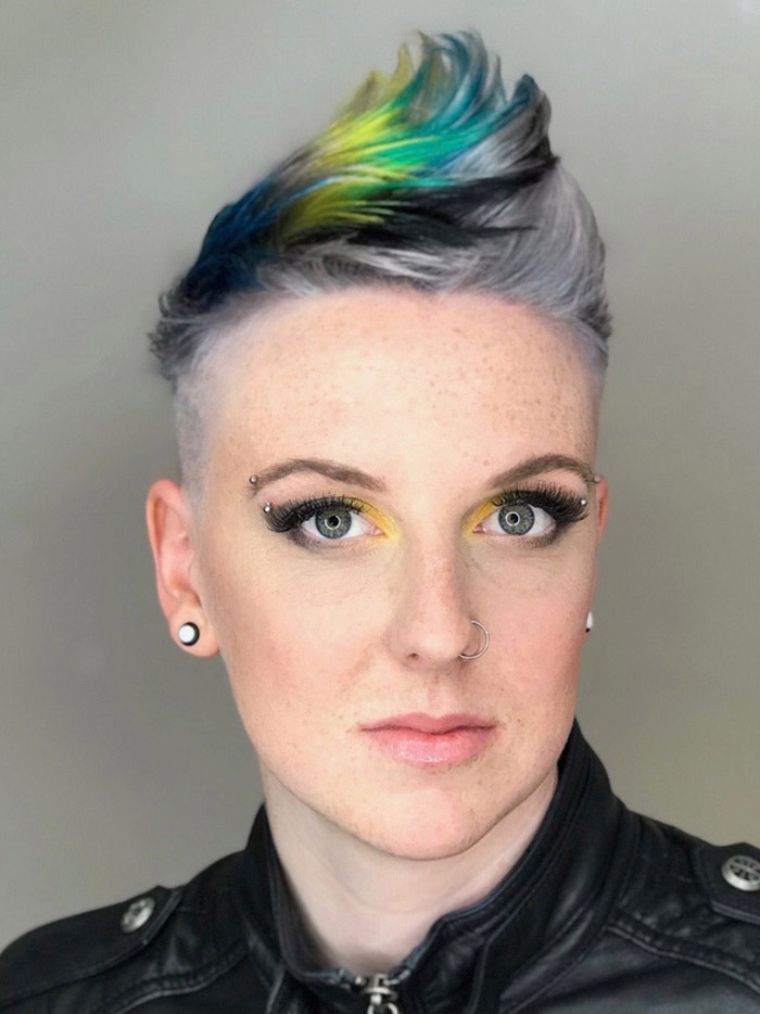 woman with short hair styled in multi colours